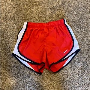 red nike running shorts